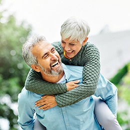 Older couple smiling and laughing together