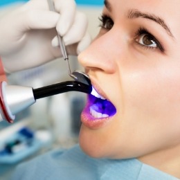 Close up of woman getting cosmetic dental bonding