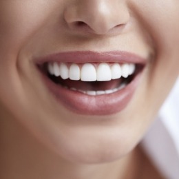 Close up of person smiling with bright white teeth
