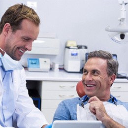 Man smiling at the dentist