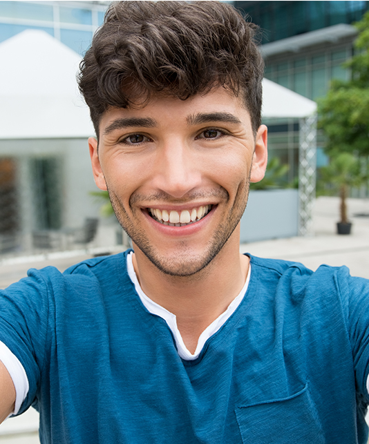 Selfie of a teenage boy in a blue T shirt