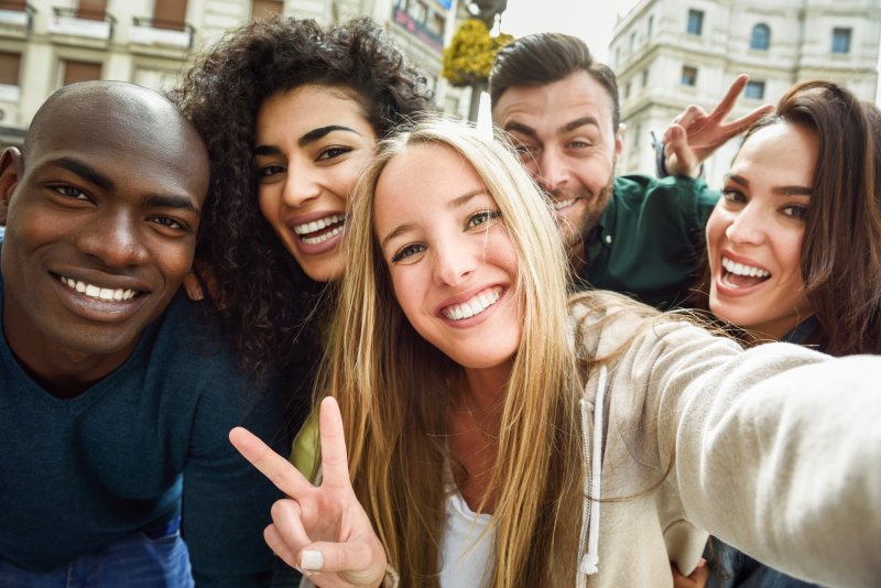 group of young friends smiling